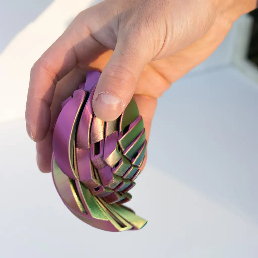 3D Printed Spiral Ball – Liquid Motion Desk Decor
