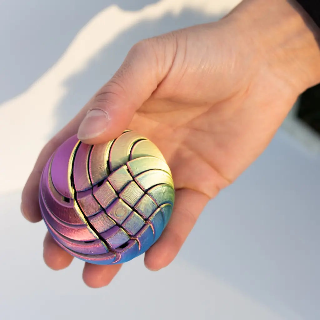 3D Printed Spiral Ball – Liquid Motion Desk Decor